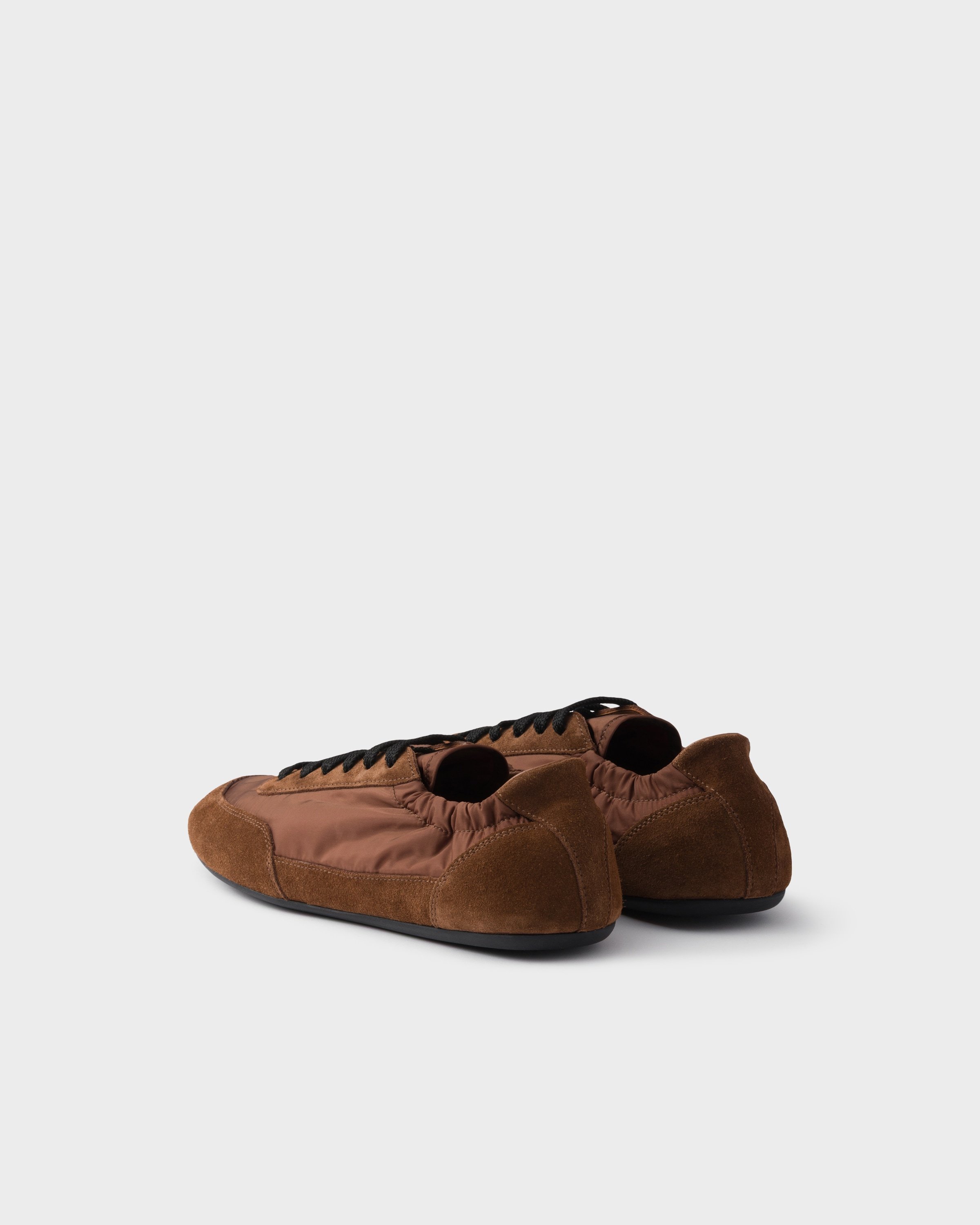 Prada Geometric Tread Lightweight Ballerina Sole In Brown
