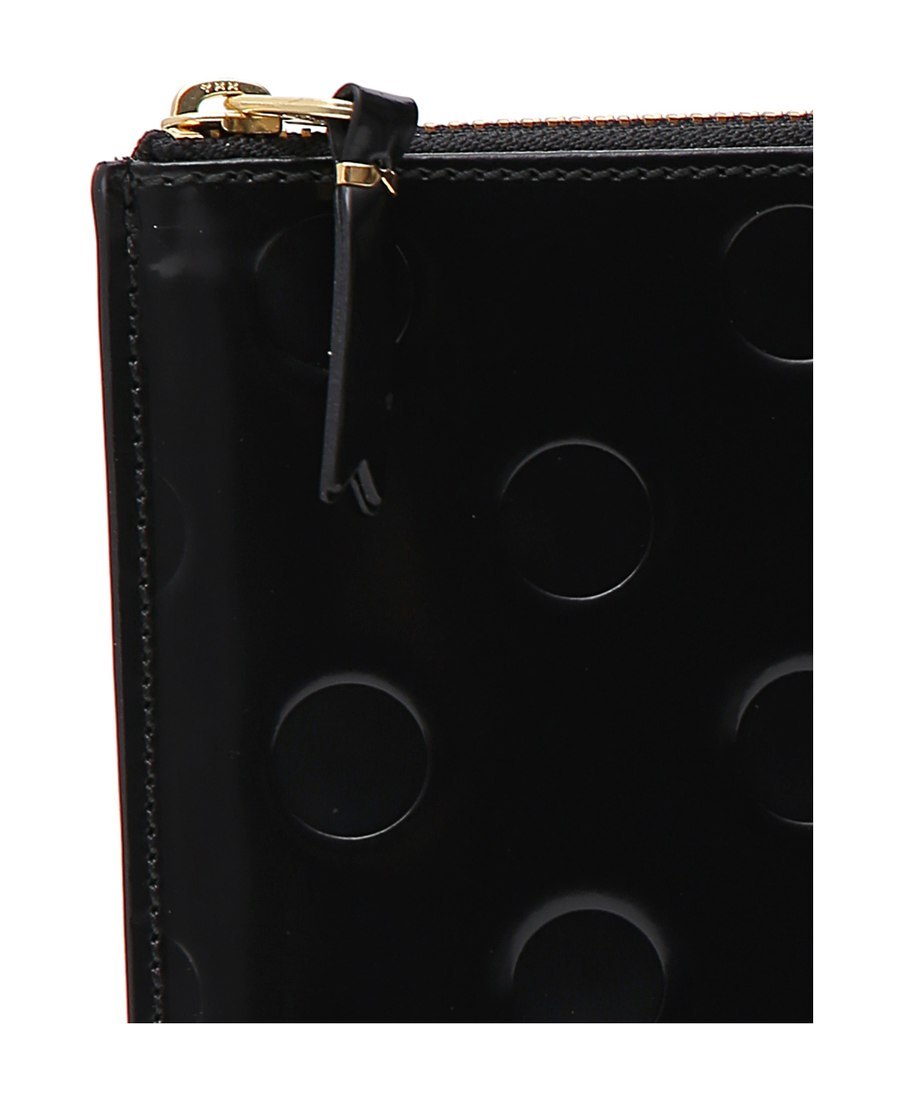 Comme Des Garçons Dot Embossed Zipped Wallet In Black