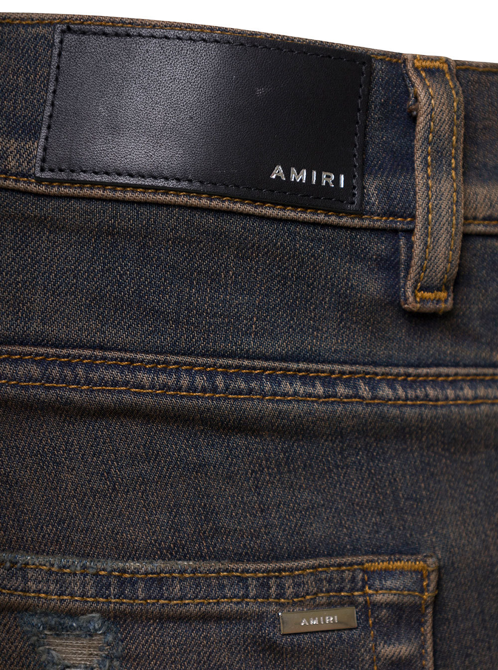 Amiri Ripped Jeans In Black