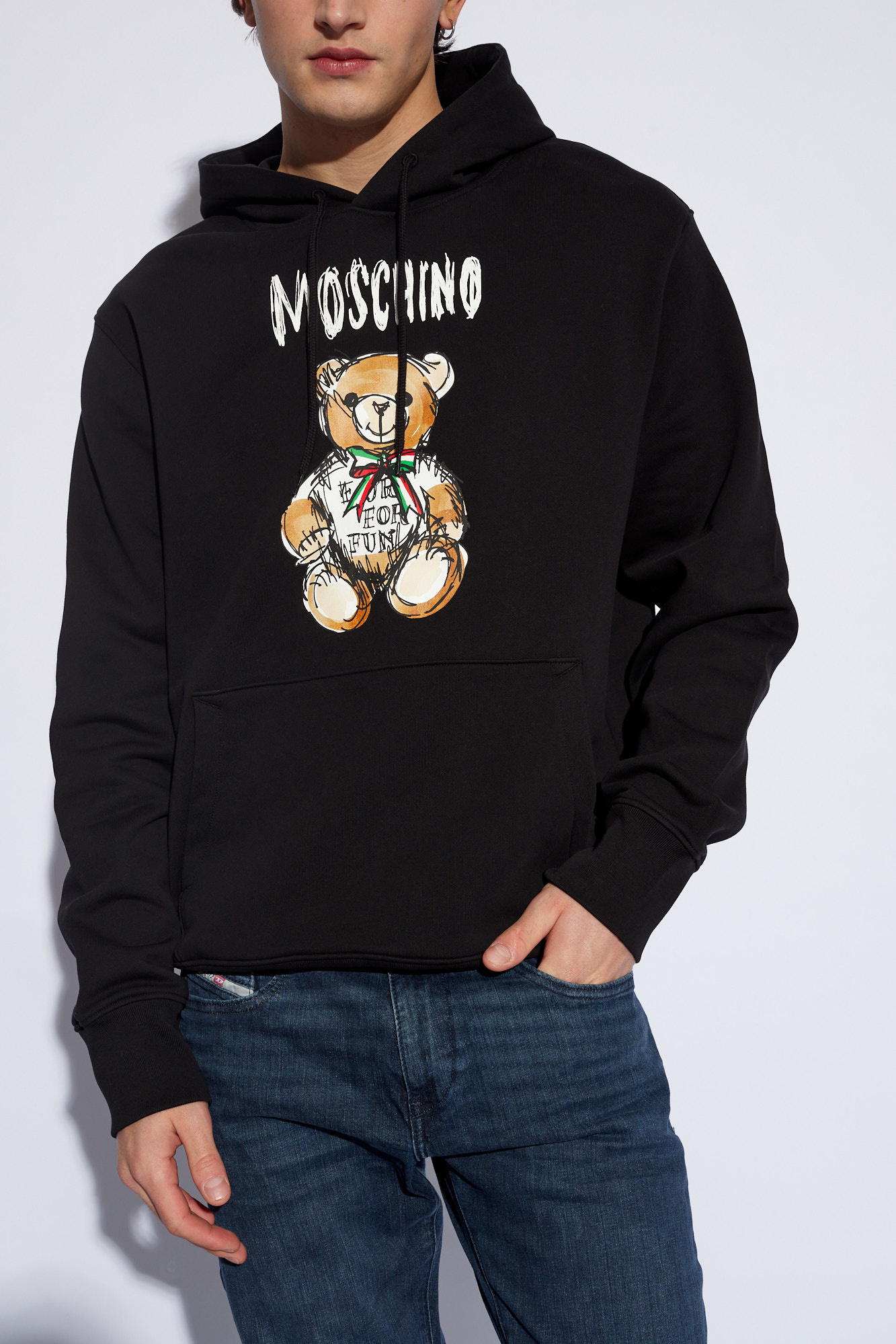 Moschino Long-sleeved Sweater In Black