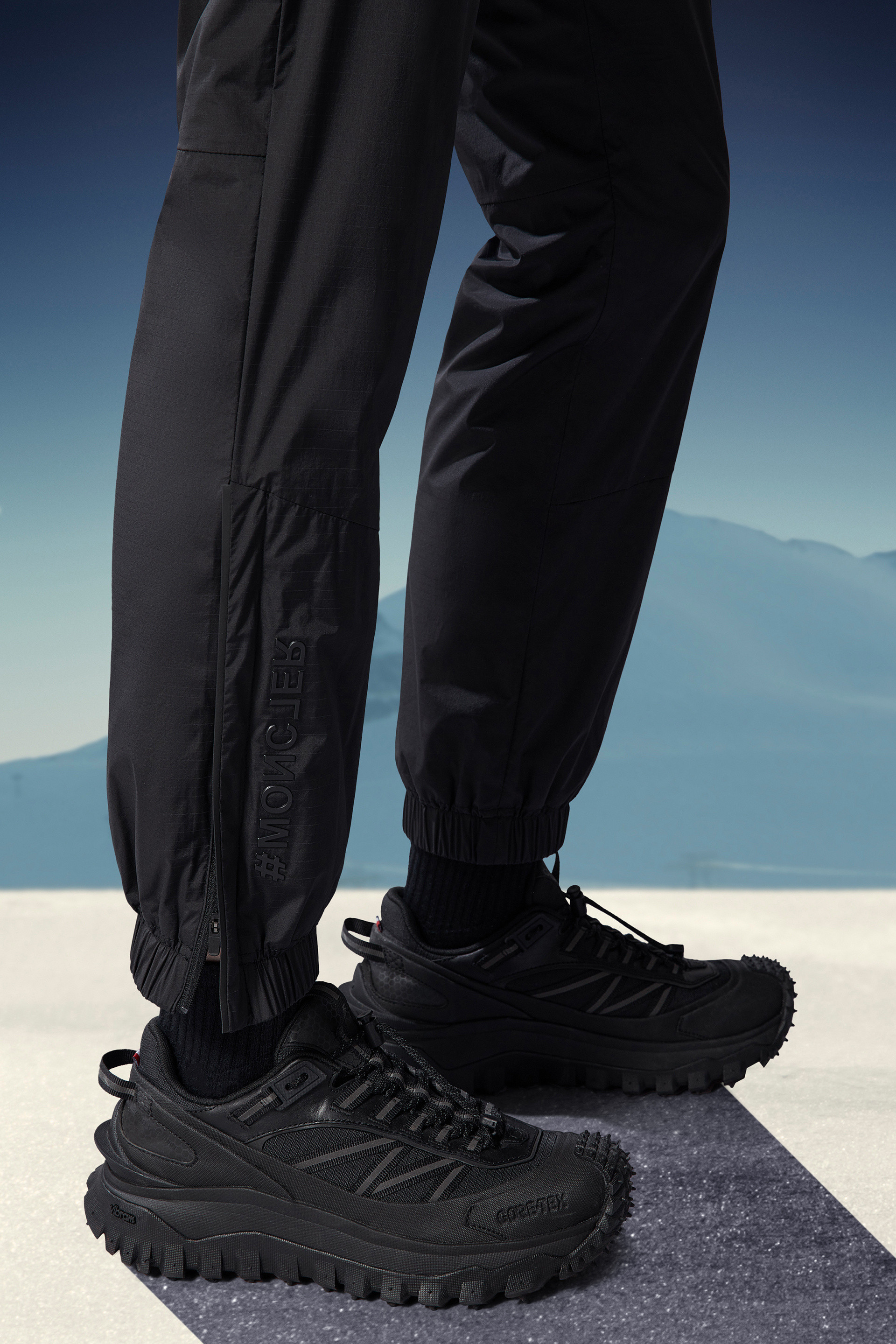 Shop Moncler Ripstop Trousers In Black