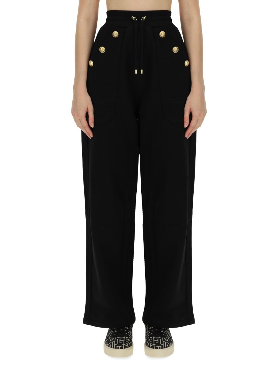 Shop Balmain Loose-fitting Buttoned Joggers In Black