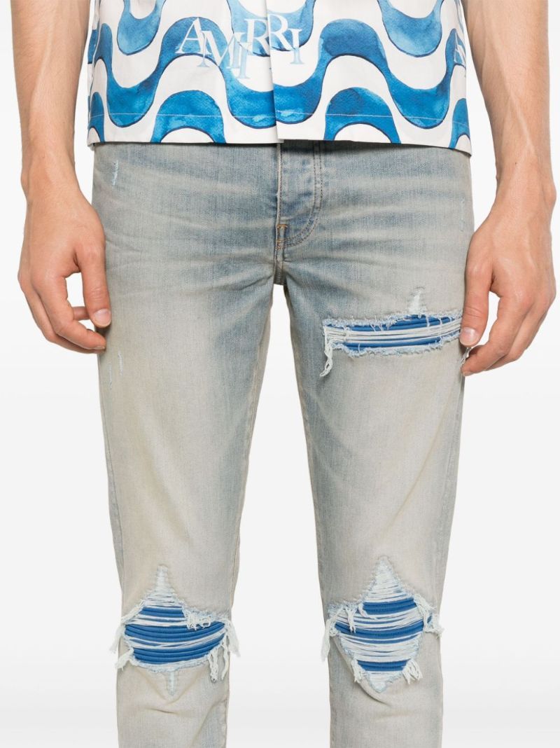 Amiri Mx1 Skinny-fit Panelled Distressed Jeans In Gray