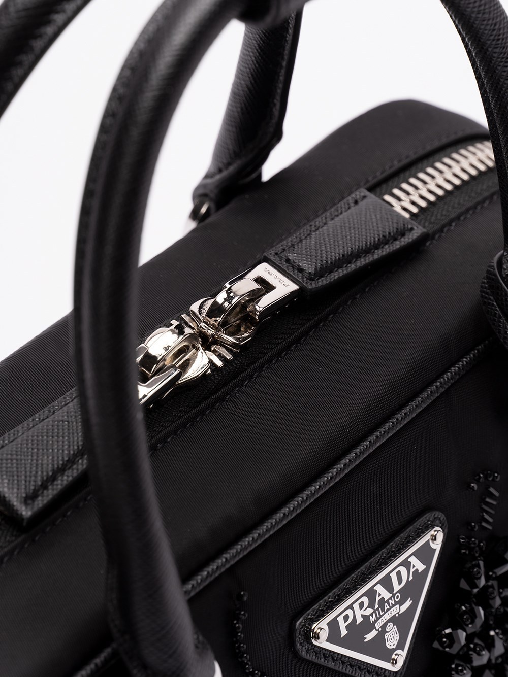 Prada Triangle Logo-embroidered Top Handle Bag In Black