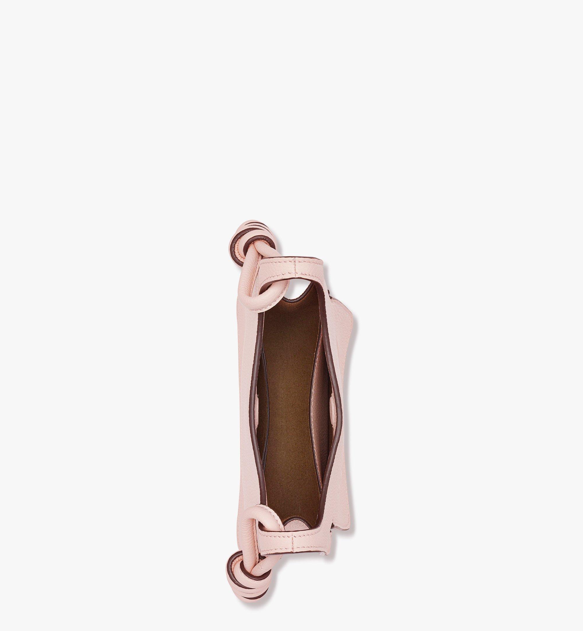Mcm Himmel Embossed Logo Leather Semilunar Shoulder Bag In Pink