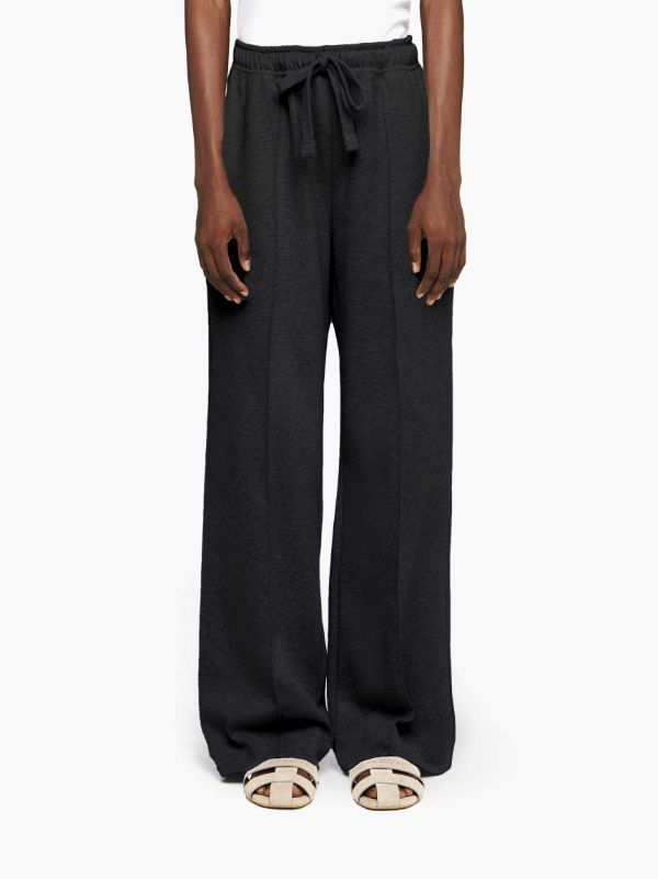 Jw Anderson J. W. Anderson Relaxed Wide-leg Trousers With Elastic Waistband In Black
