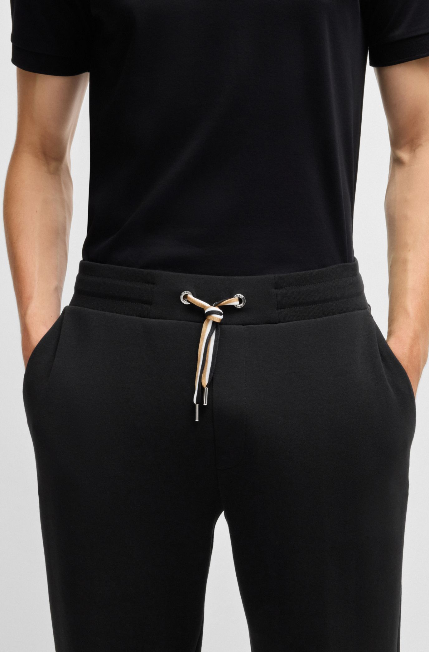 Hugo Boss Tracksuit Bottoms With Signature-stripe Cords In Black