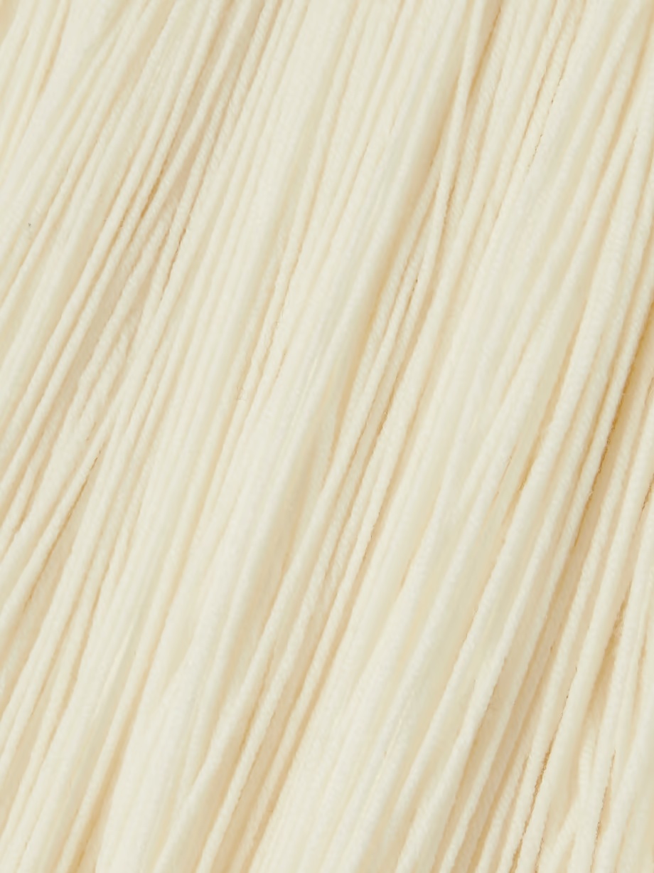 Shop Alaïa Tassel Wool Turtleneck In White