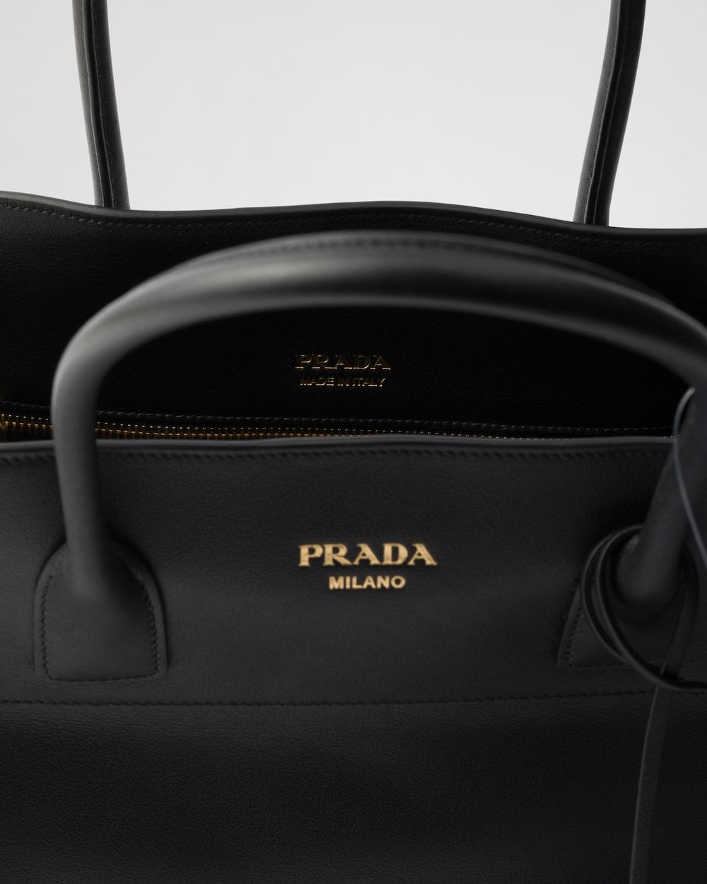 Prada Large Leather Tote Bag In Black