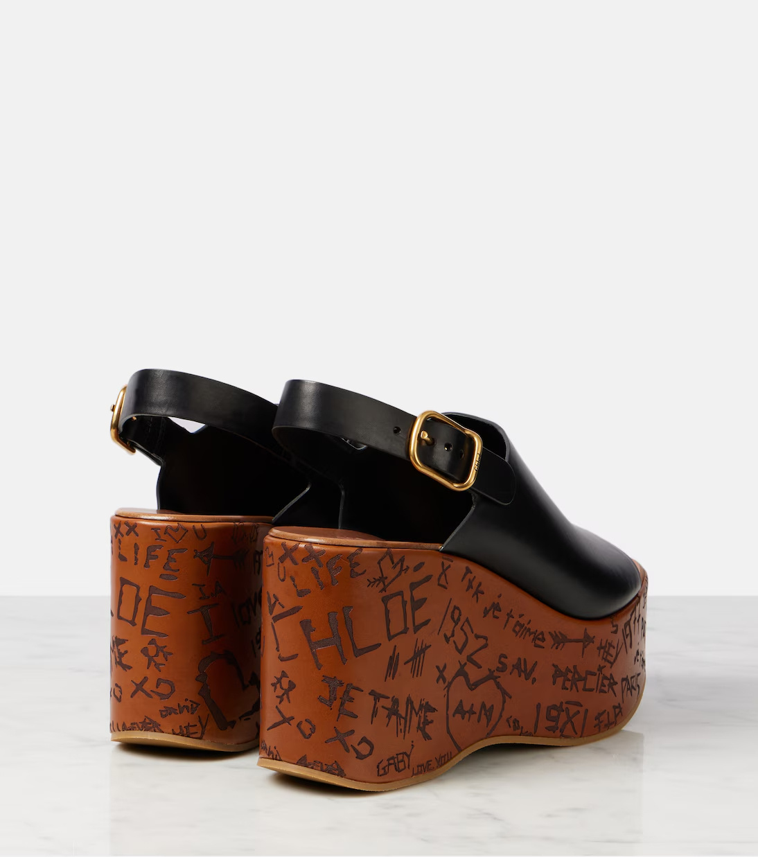 Chloé Maxime Black Wedge With Engraved Written Decorations And Logo Buckle In Leather Woman