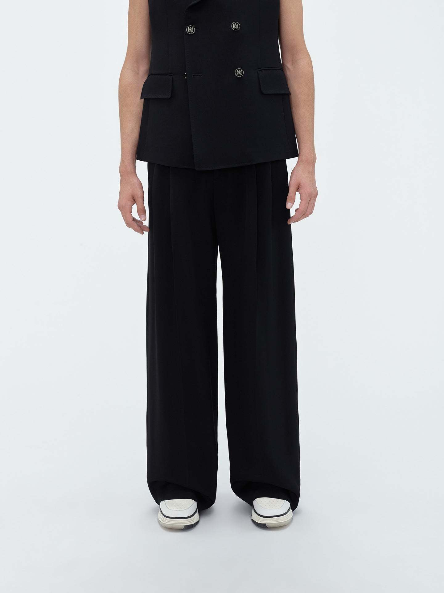 AMIRI AMIRI LOGO PATCH TAPERED LEG TROUSERS