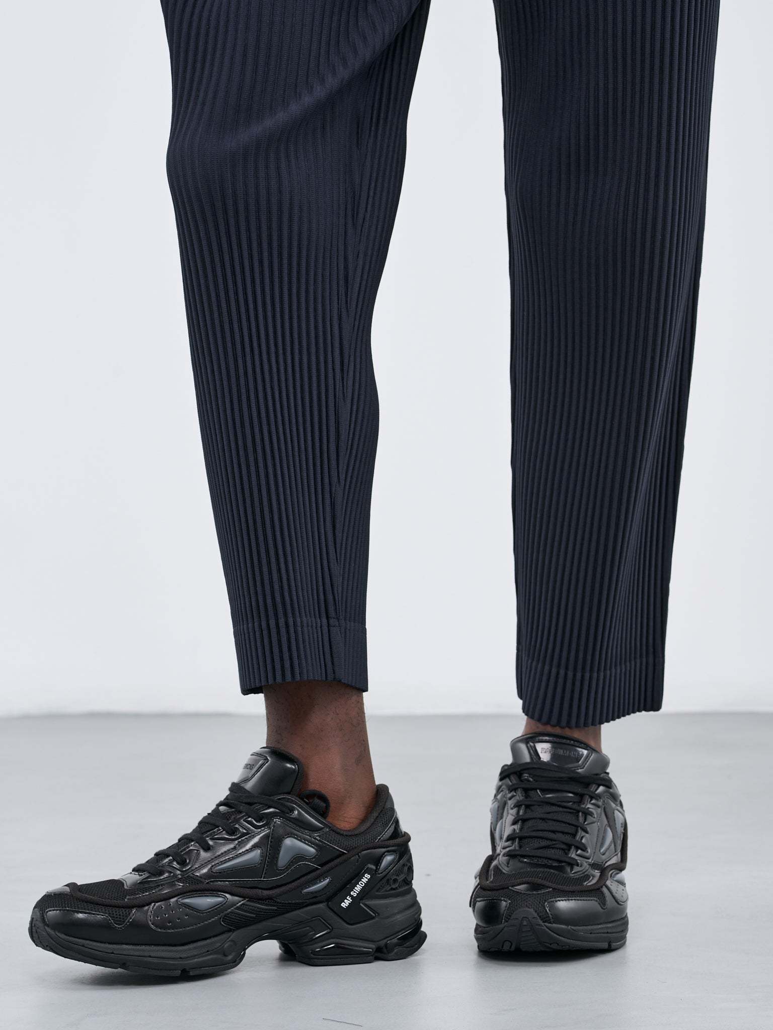 Shop Issey Miyake Straight-leg Pleated Trousers In Black