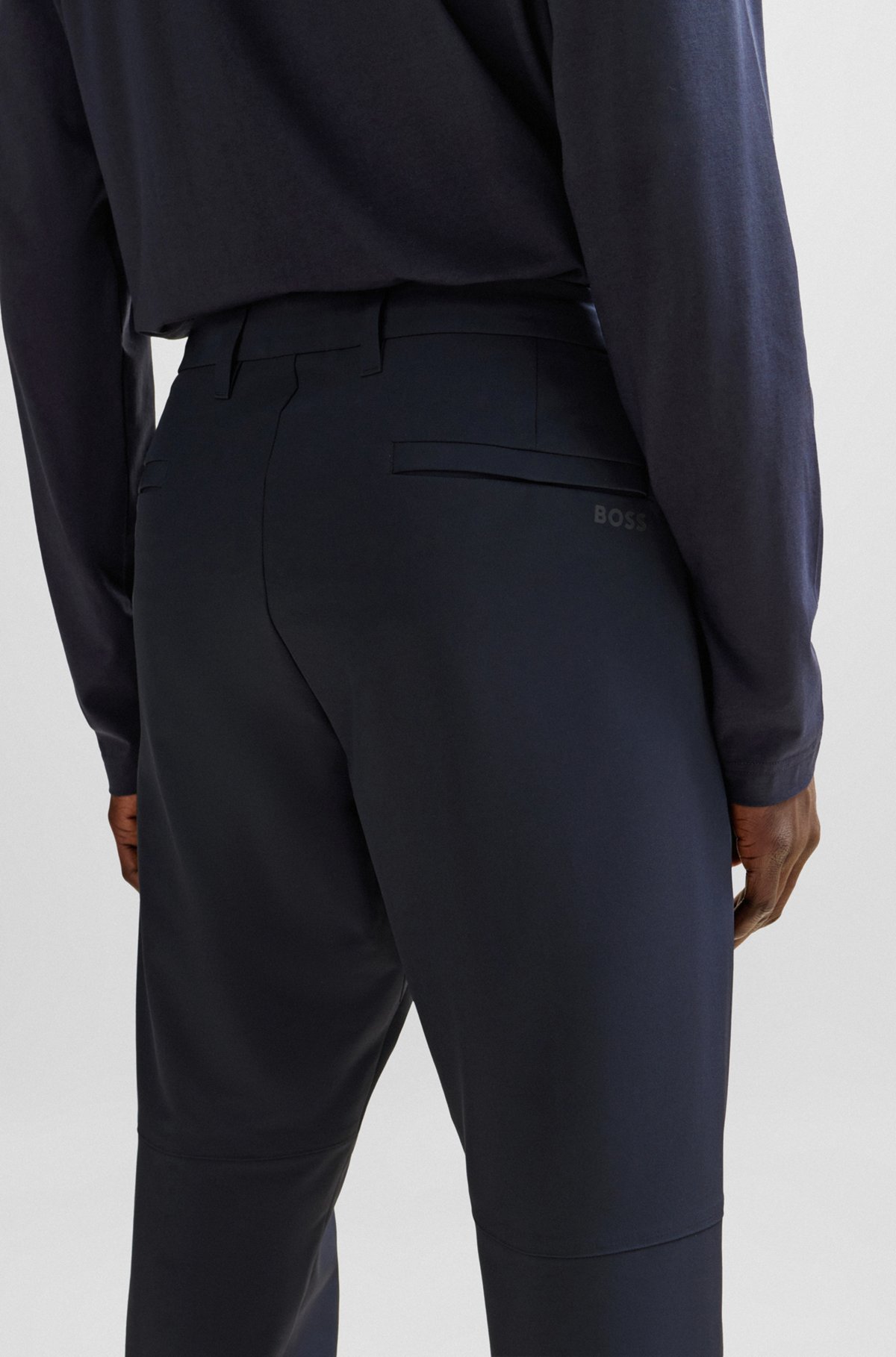 Hugo Boss Water-repellent Tapered Trousers In Black
