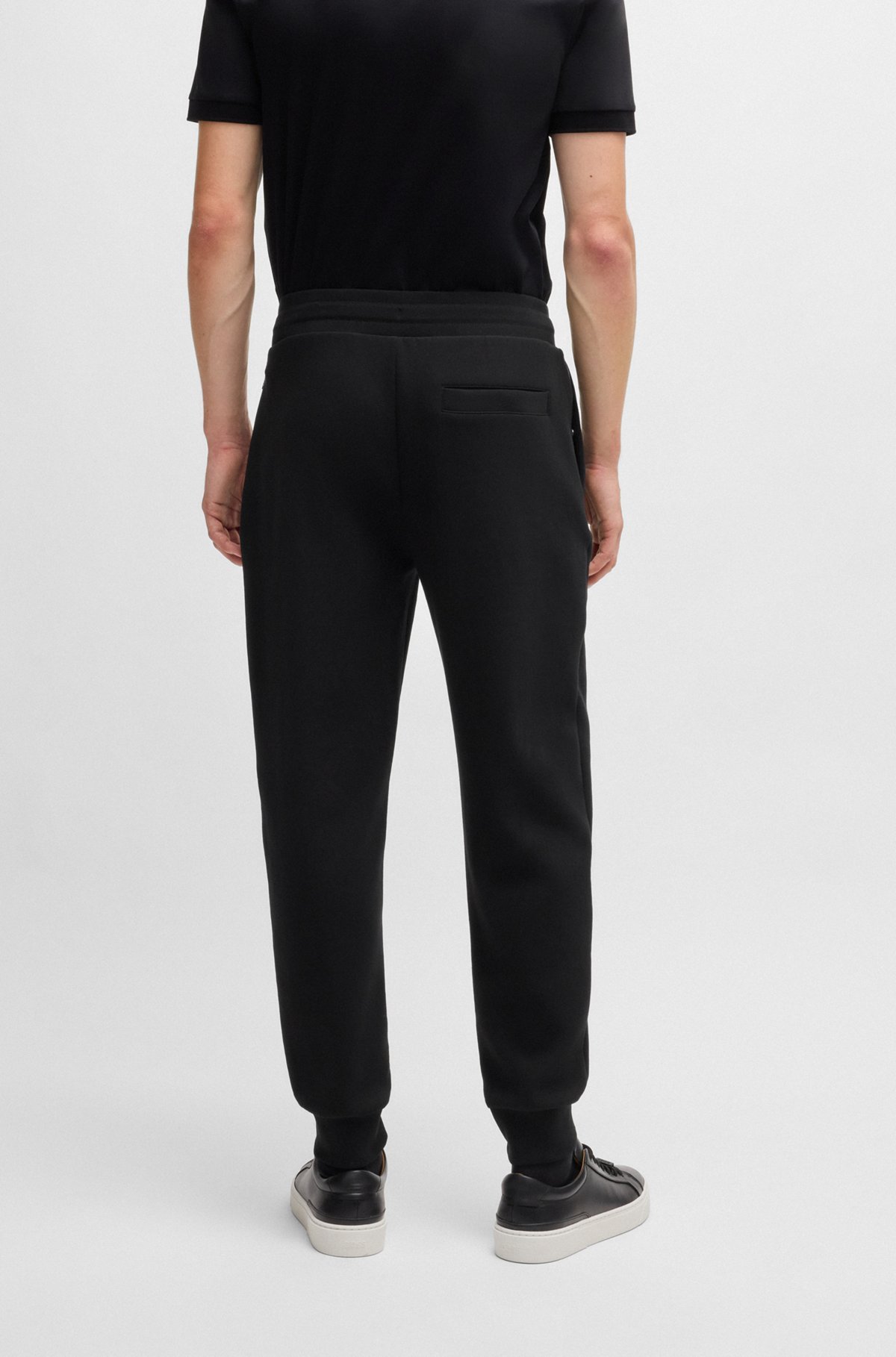Hugo Boss Tracksuit Bottoms With Signature-stripe Cords In Black