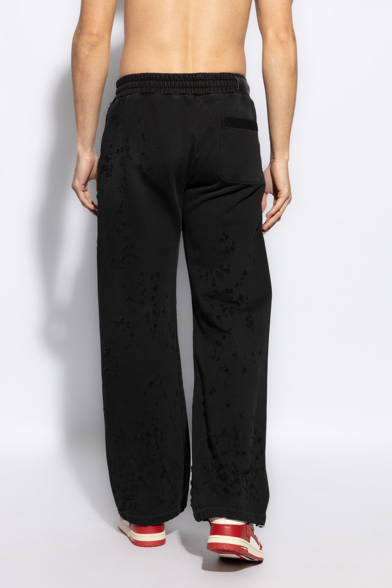 Amiri Distressed Finish Straight-legged Jogging Trousers In Black