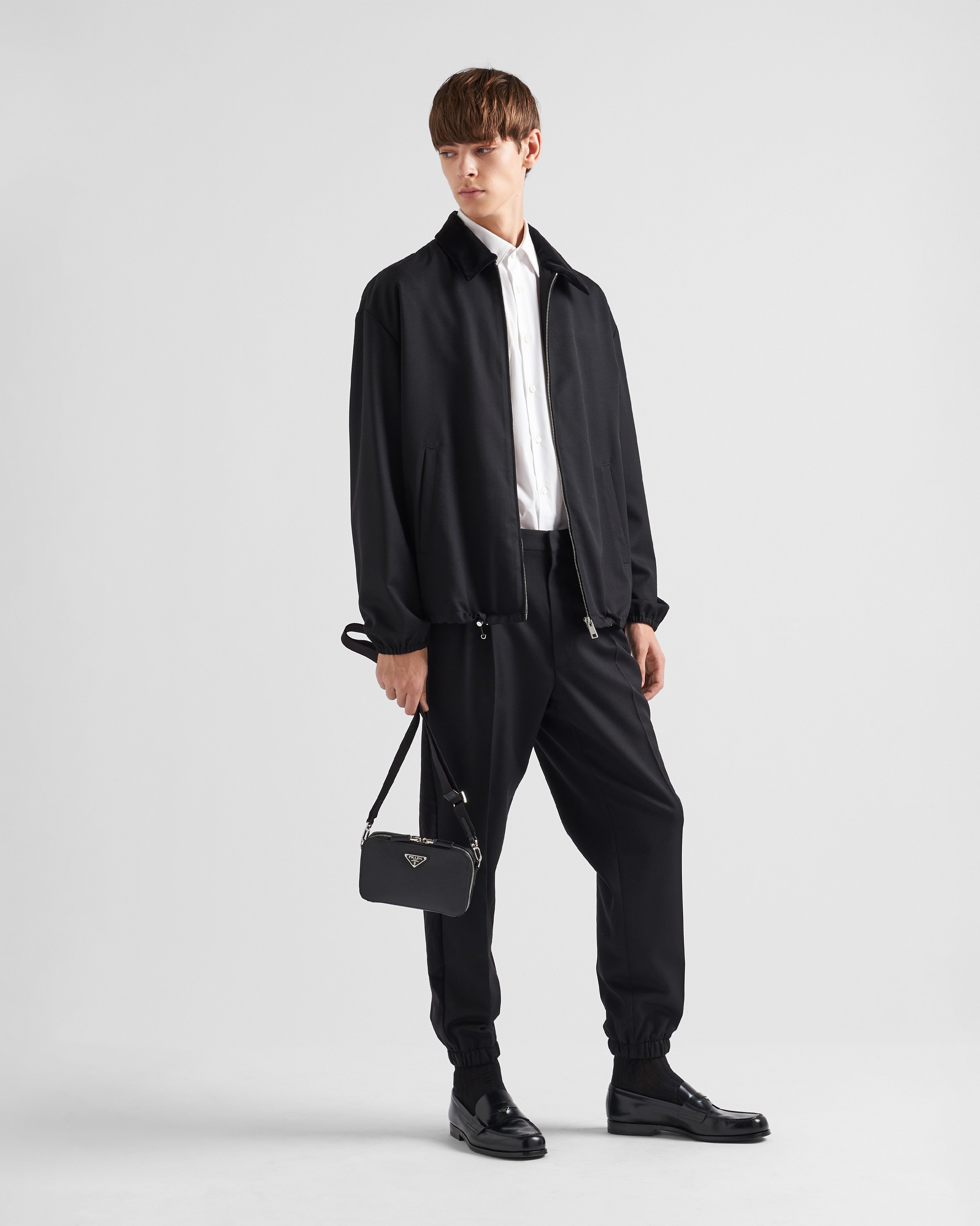 Prada Textured Leather Crossbody Bag In Black