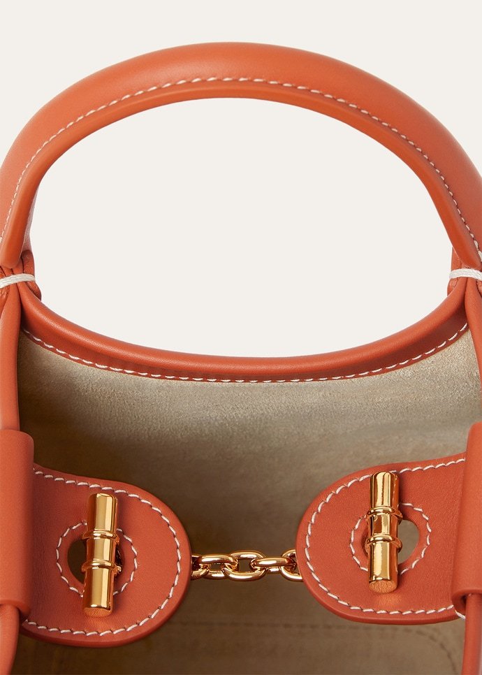 Loro Piana Bale Micro Rounded Leather Top-handle Bag In Orange