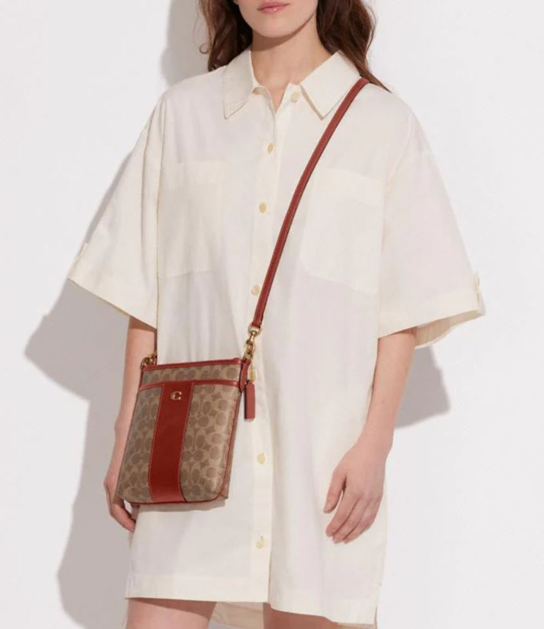 Coach Kitt Monogram Crossbody Bag In Brown