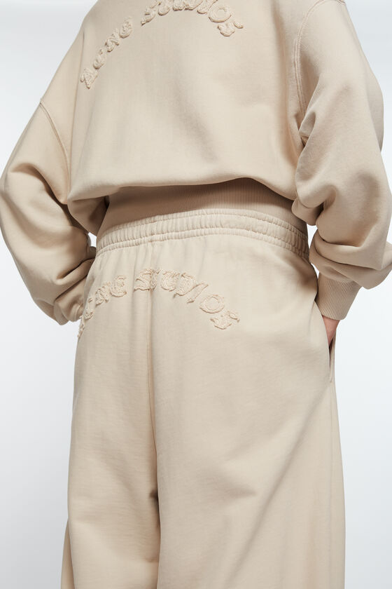 Acne Studios Logo Sweatpants In Nude