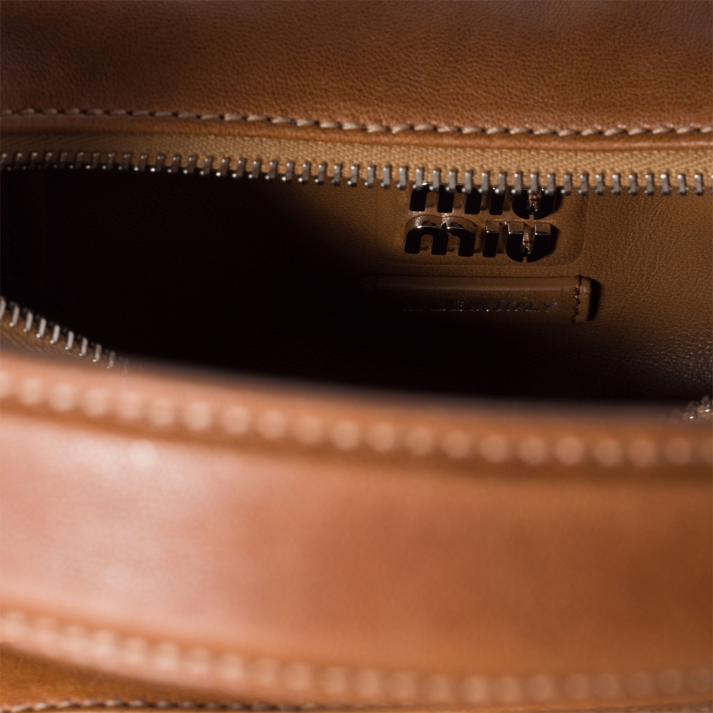 Miu Miu Pocket Nappa Leather Bag In Brown