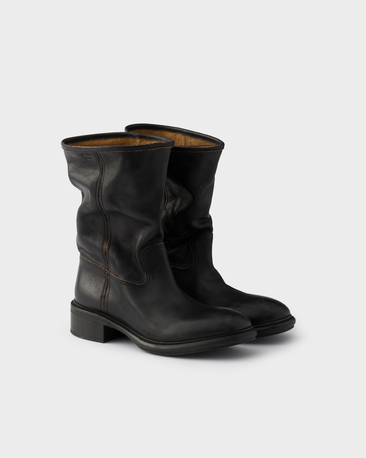 Prada Vintage-effect Leather Boots In Black