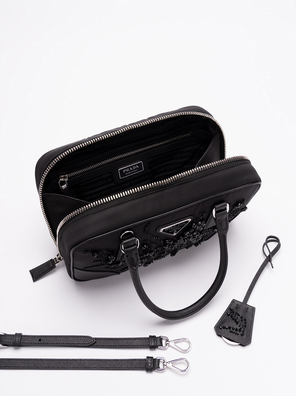 Prada Triangle Logo-embroidered Top Handle Bag In Black