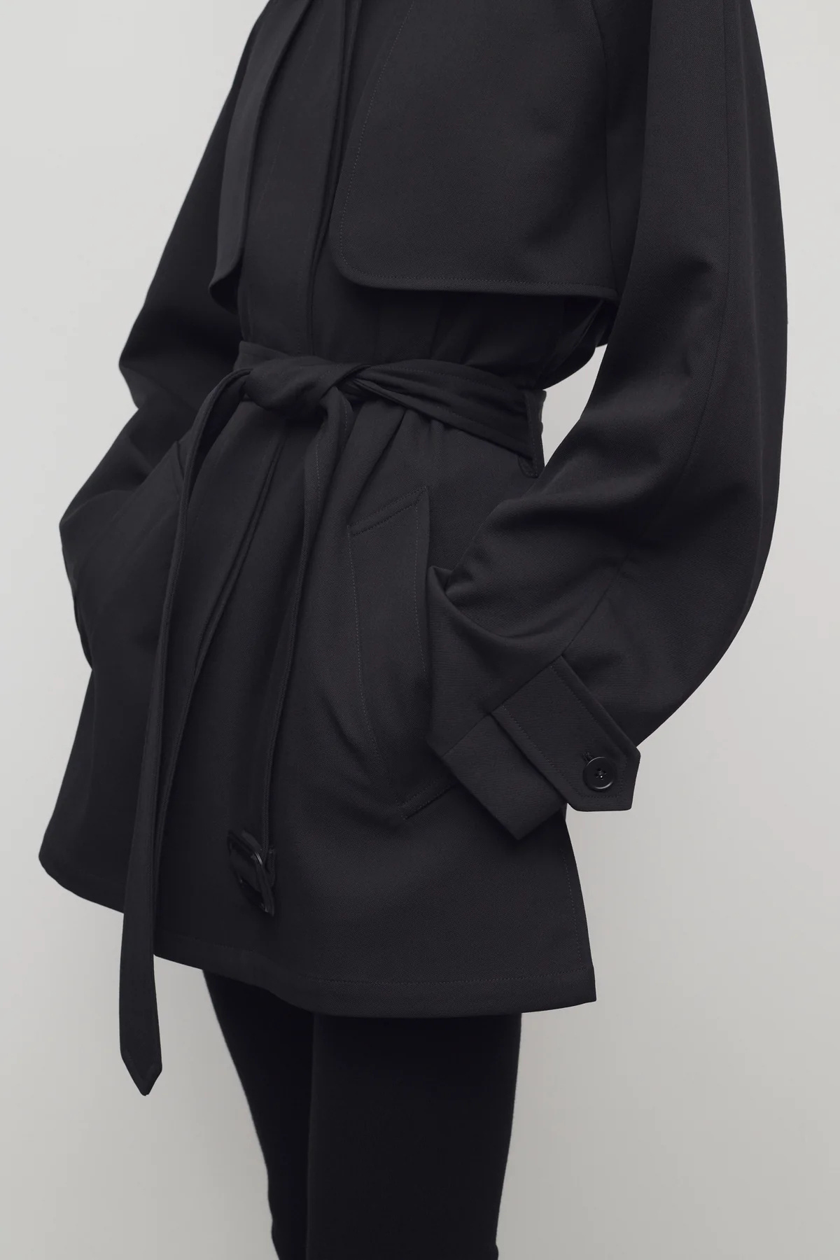 The Row Long-sleeved Trench Coat In Black