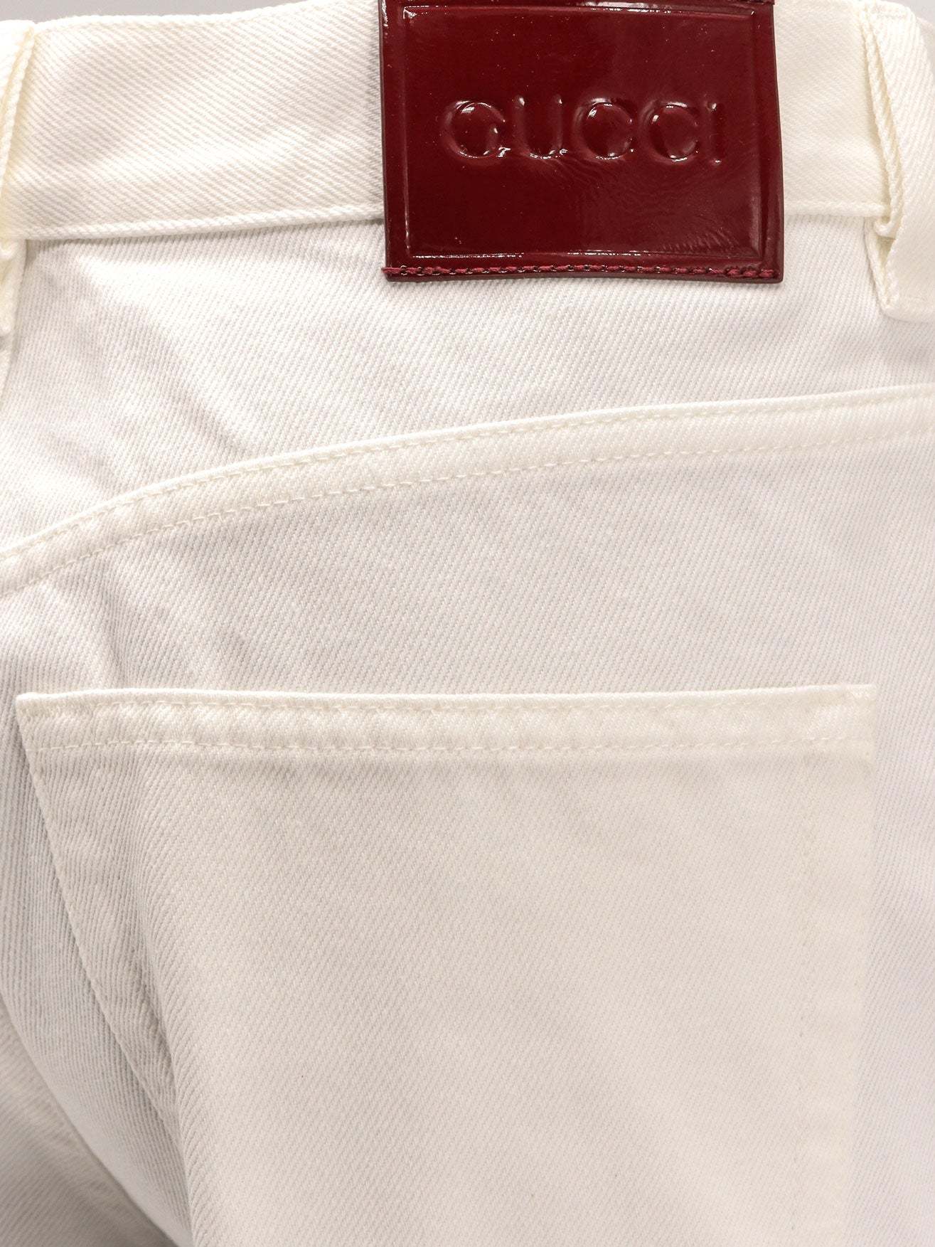 Gucci Cropped Flared Denim Pants In White