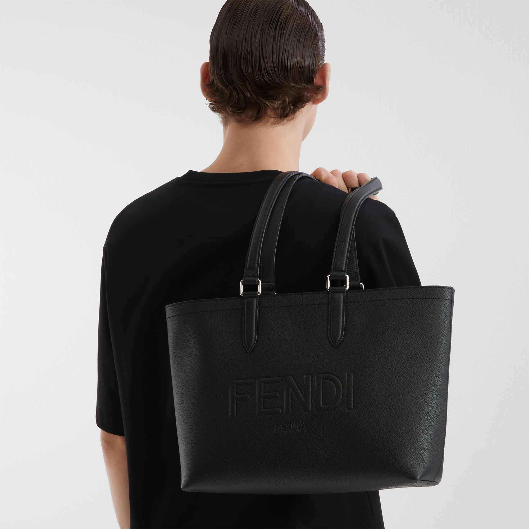 Fendi Roma Logo Embossed Tote Bag In Black