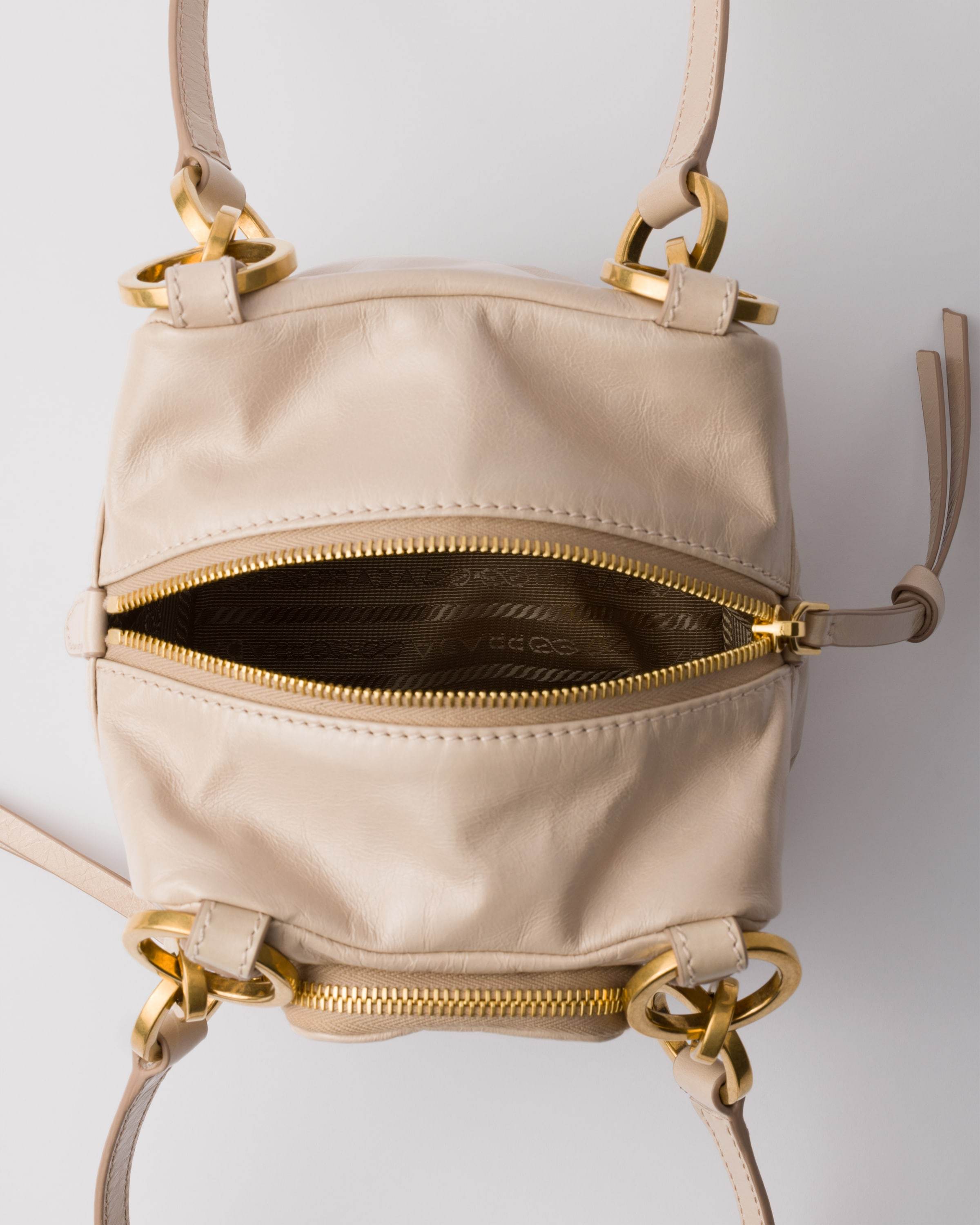 Shop Prada Dangle Leather Top-handle Mini-bag In Nude Pink