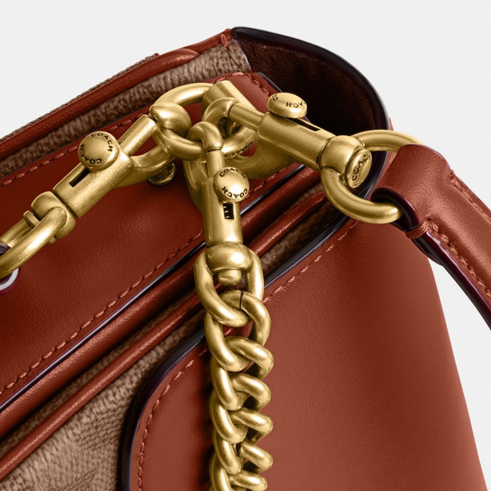 Shop Coach Cassie Cross Body Bag In Brown