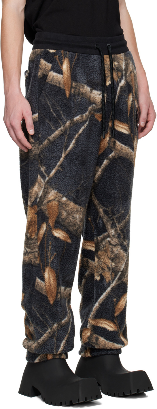 Moose Knuckles Graphic-print Fleece Track Pants In Black