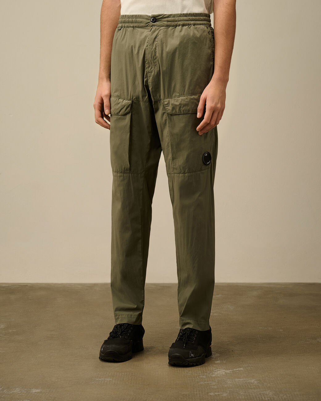 C.p. Company Lens-detail Cargo Trousers In Green