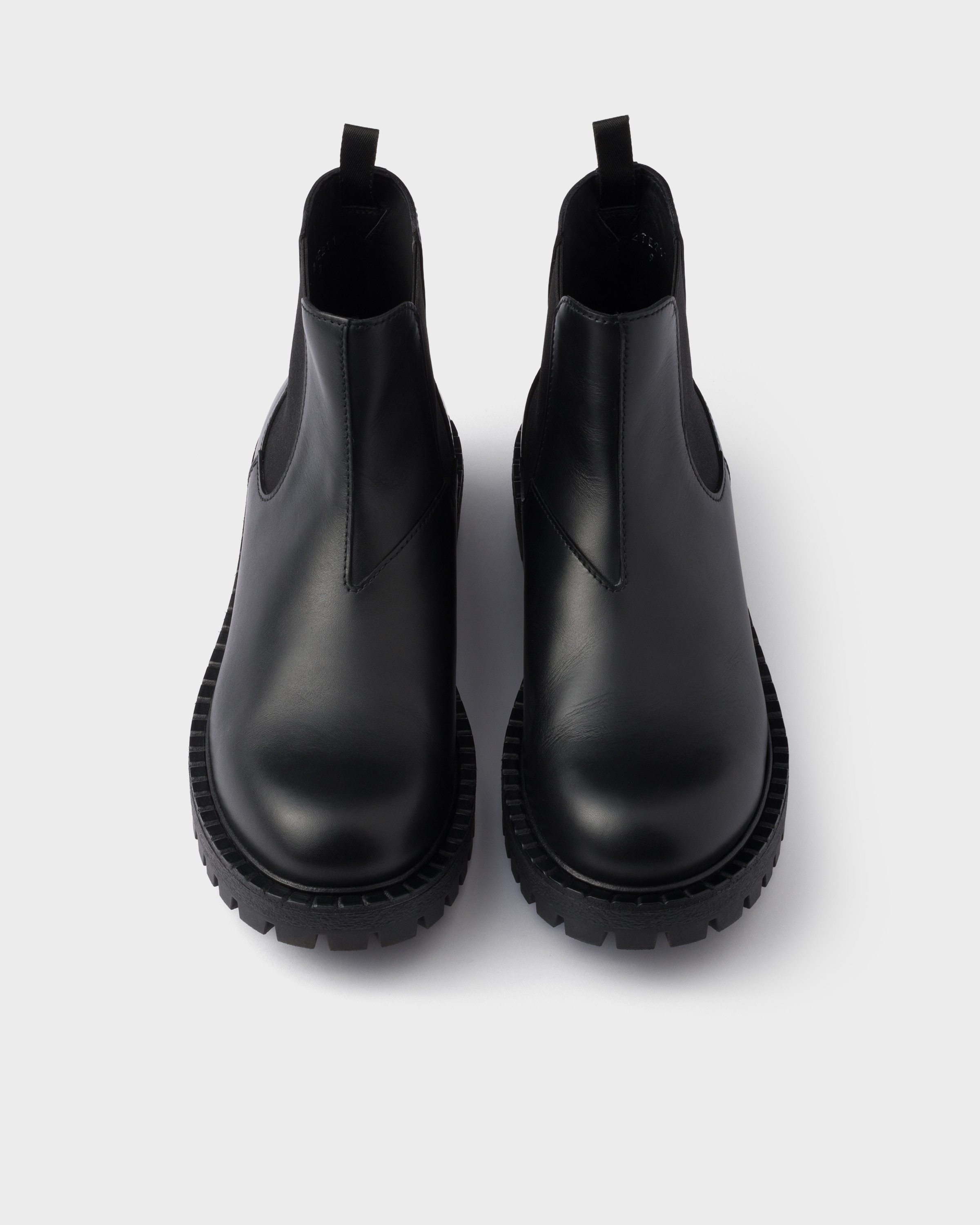 Prada Leather Chelsea Boots In Black