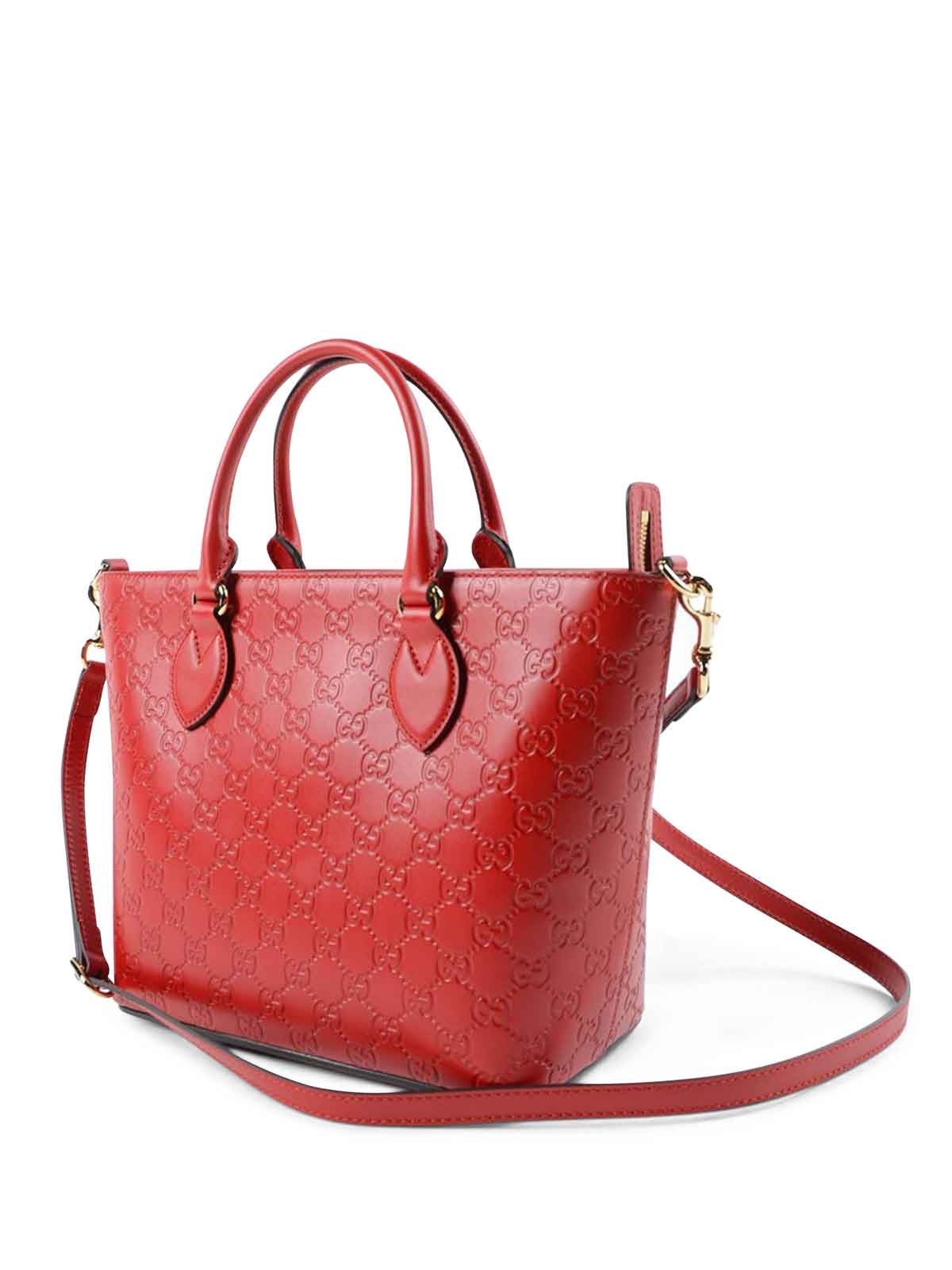 GUCCI GG LOGO EMBOSSED HANDBAG