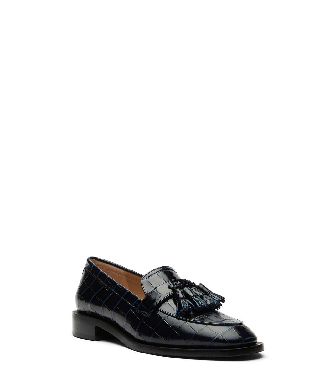 Stuart Weitzman Crocodile-effect Tasseled Loafers In Black