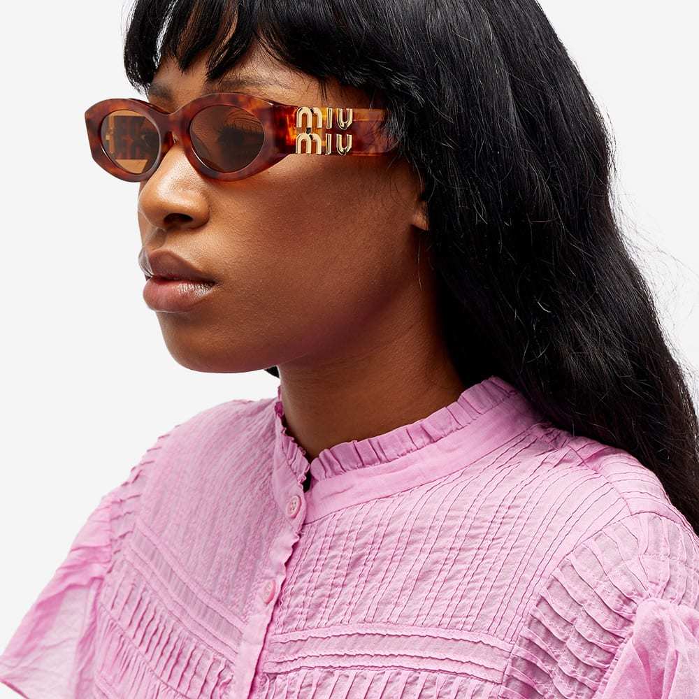 Miu Miu Logo Sunglasses In Orange