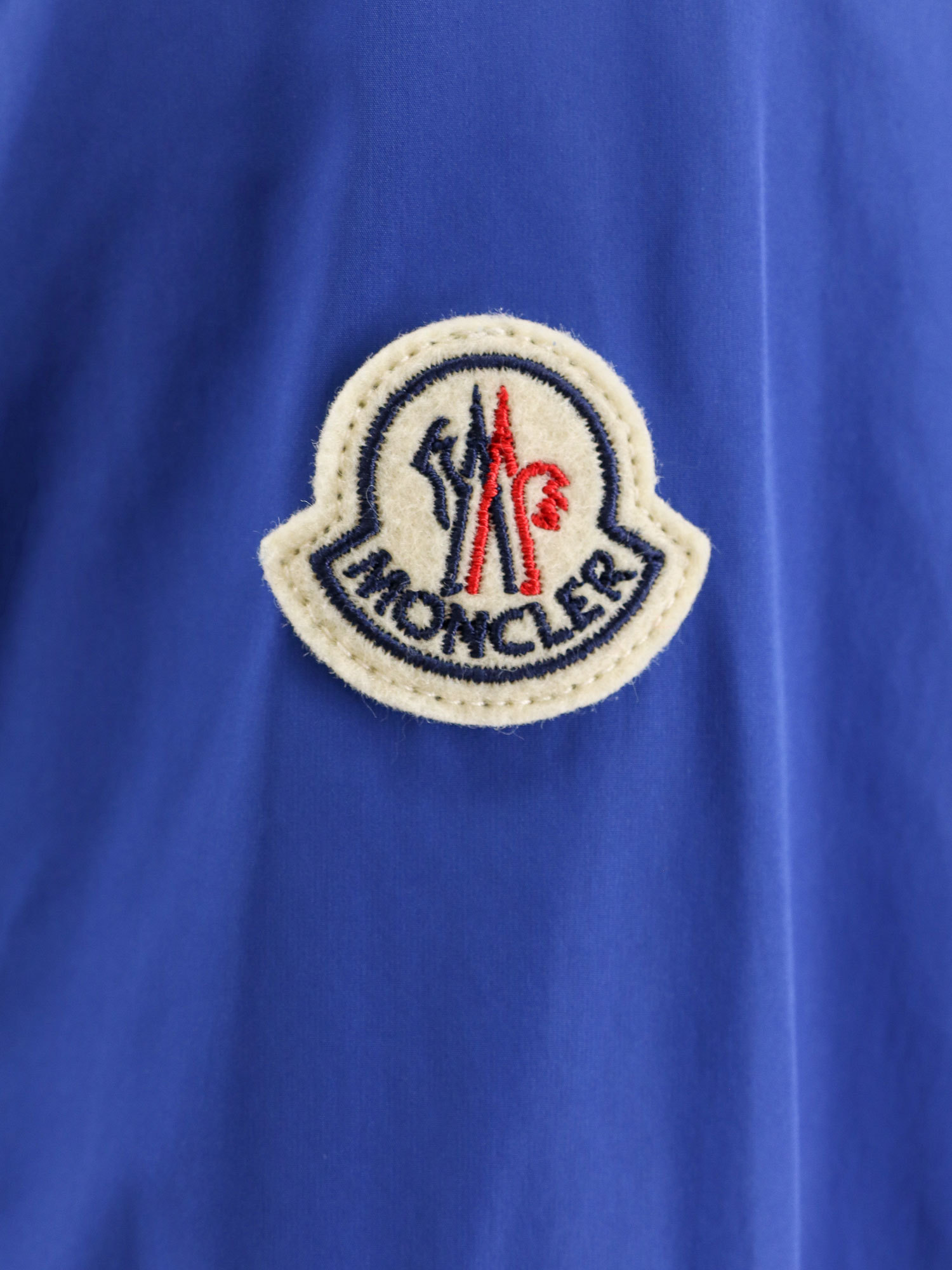 Shop Moncler Logo-appliqué Lightweight Jacket In Blue
