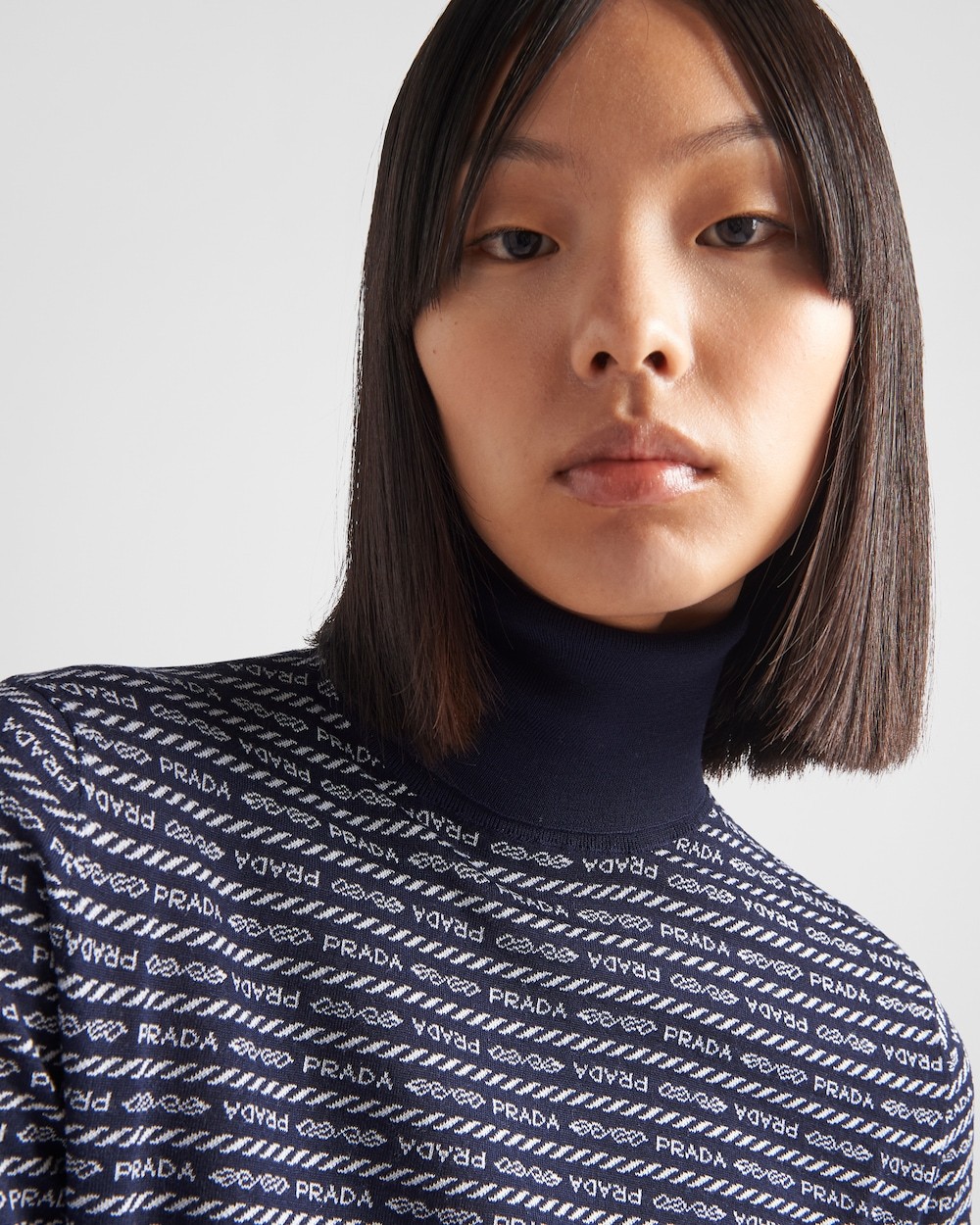 Prada Superfine Wool Turtleneck Sweater With Intarsia Logo In Black