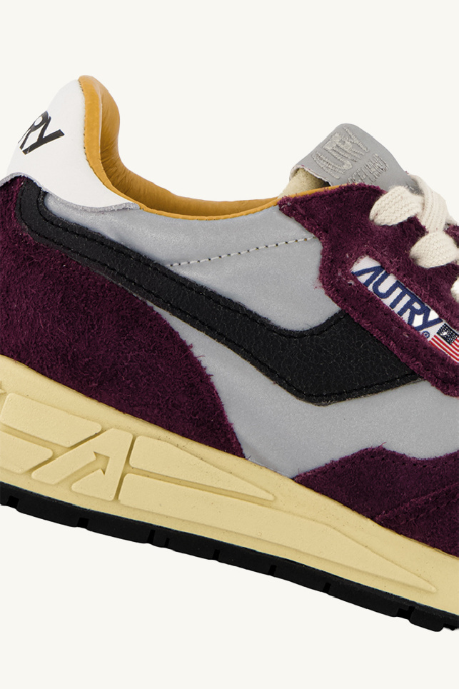 Shop Autry Laced Sneakers In Black