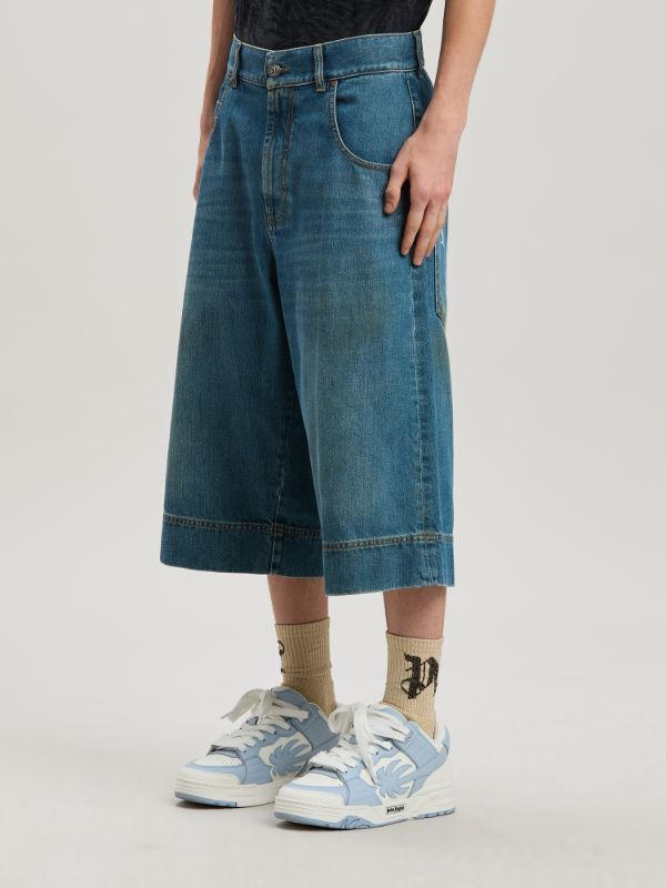 Palm Angels Lasered Curved Logo Denim Skater Bermuda In Blue
