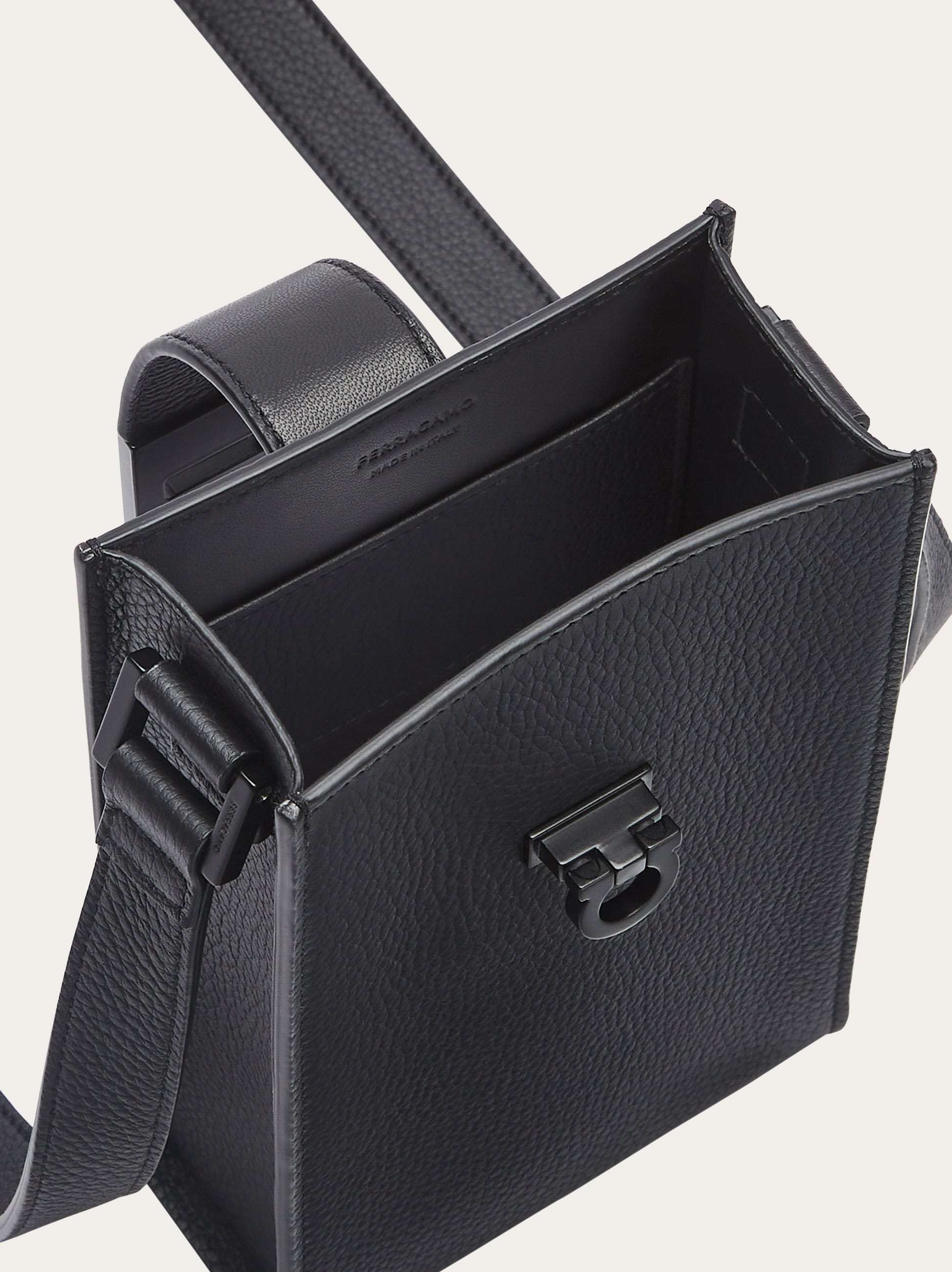 Shop Ferragamo Salvatore Gancini Flip-lock Fastened Crossbody Bag In Black