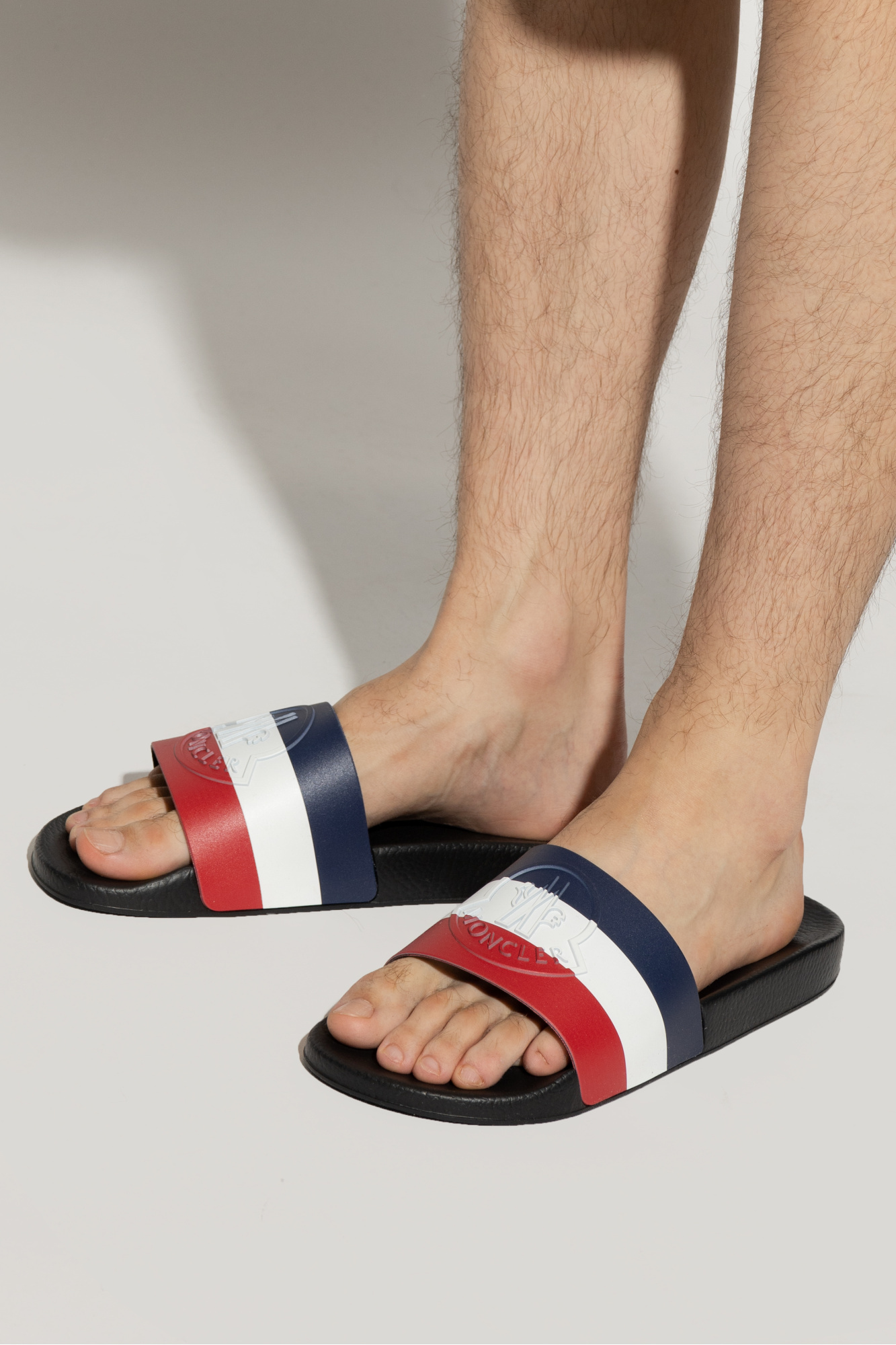 Shop Moncler Slip-on Debossed-logo Slides In Black