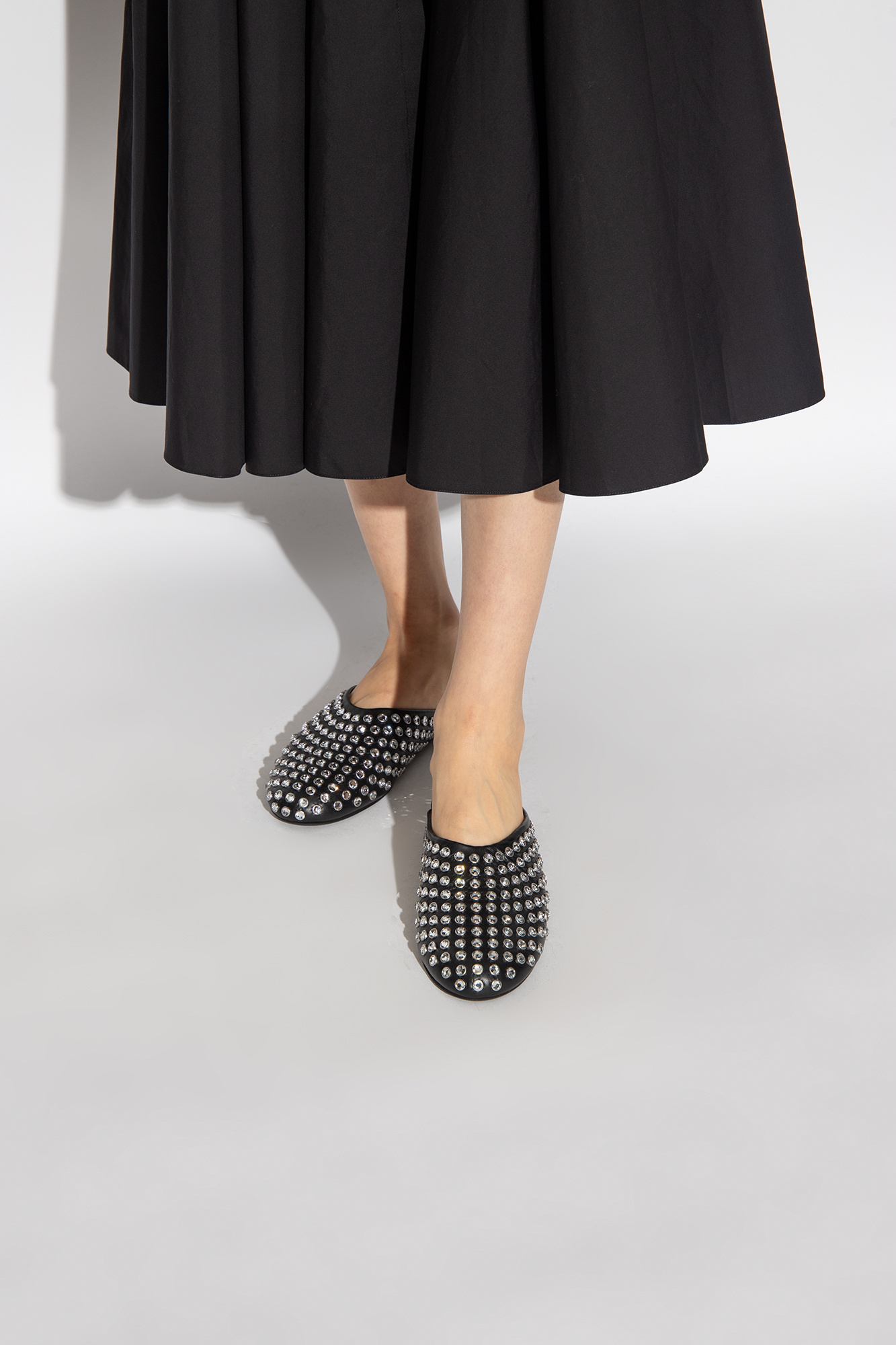 Alaïa Women Black Nappa Leather Rhinestone Flat Mules In Black