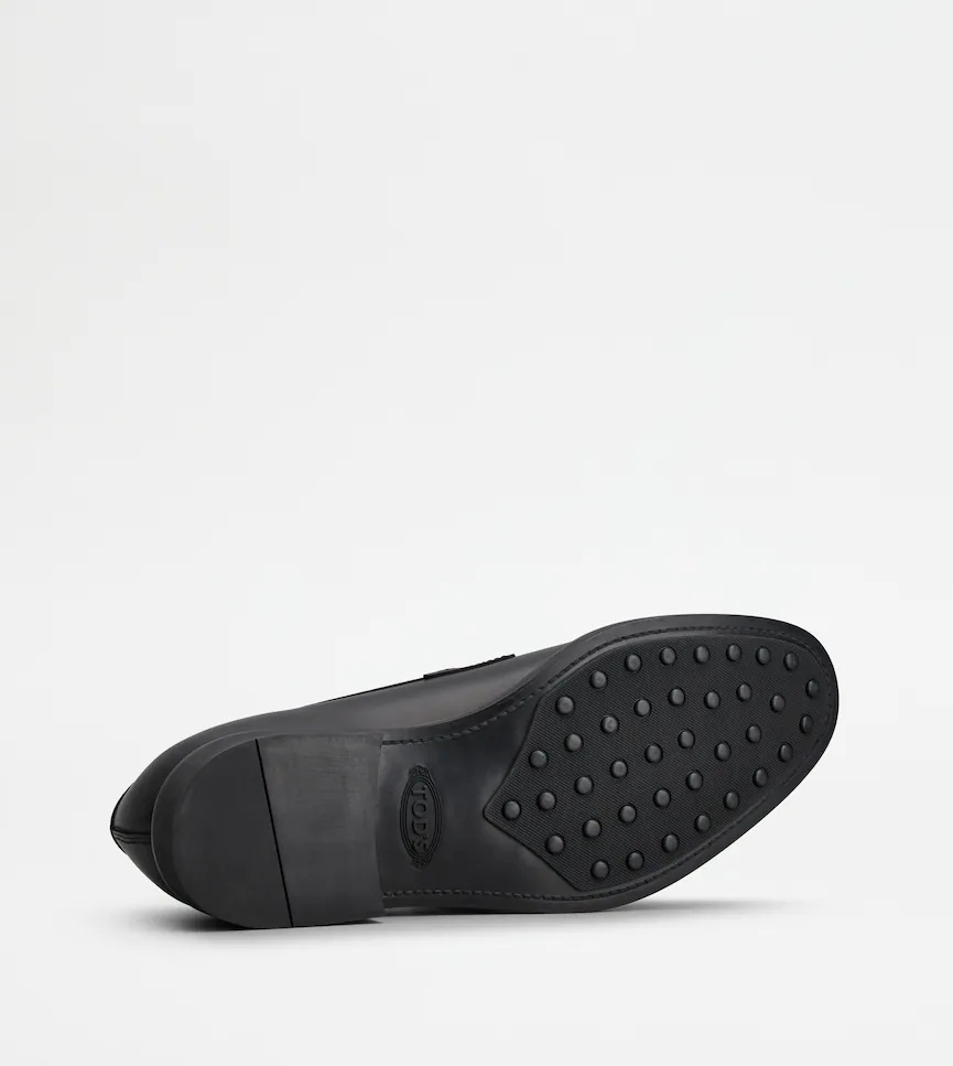 Tod's Round Toe Slip-on Loafers In Black