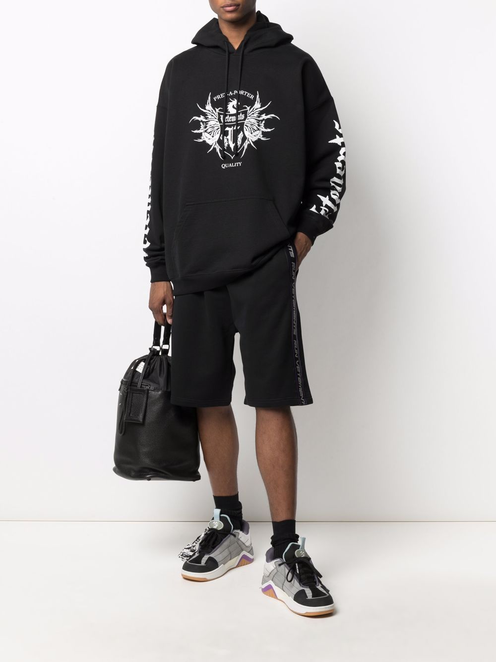 Shop Vetements Black Logo Printed Long-sleeved Hooded Sweater