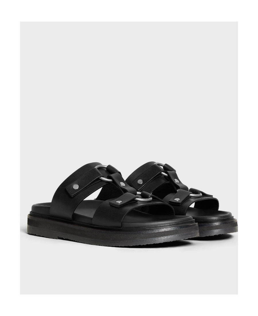 Celine Tippi-vegetable Tanned Slippers In Black