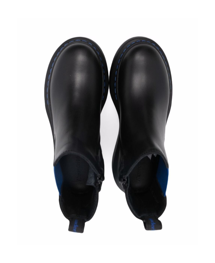 Alexander Mcqueen Thick-soled Jacketed Boots In Black