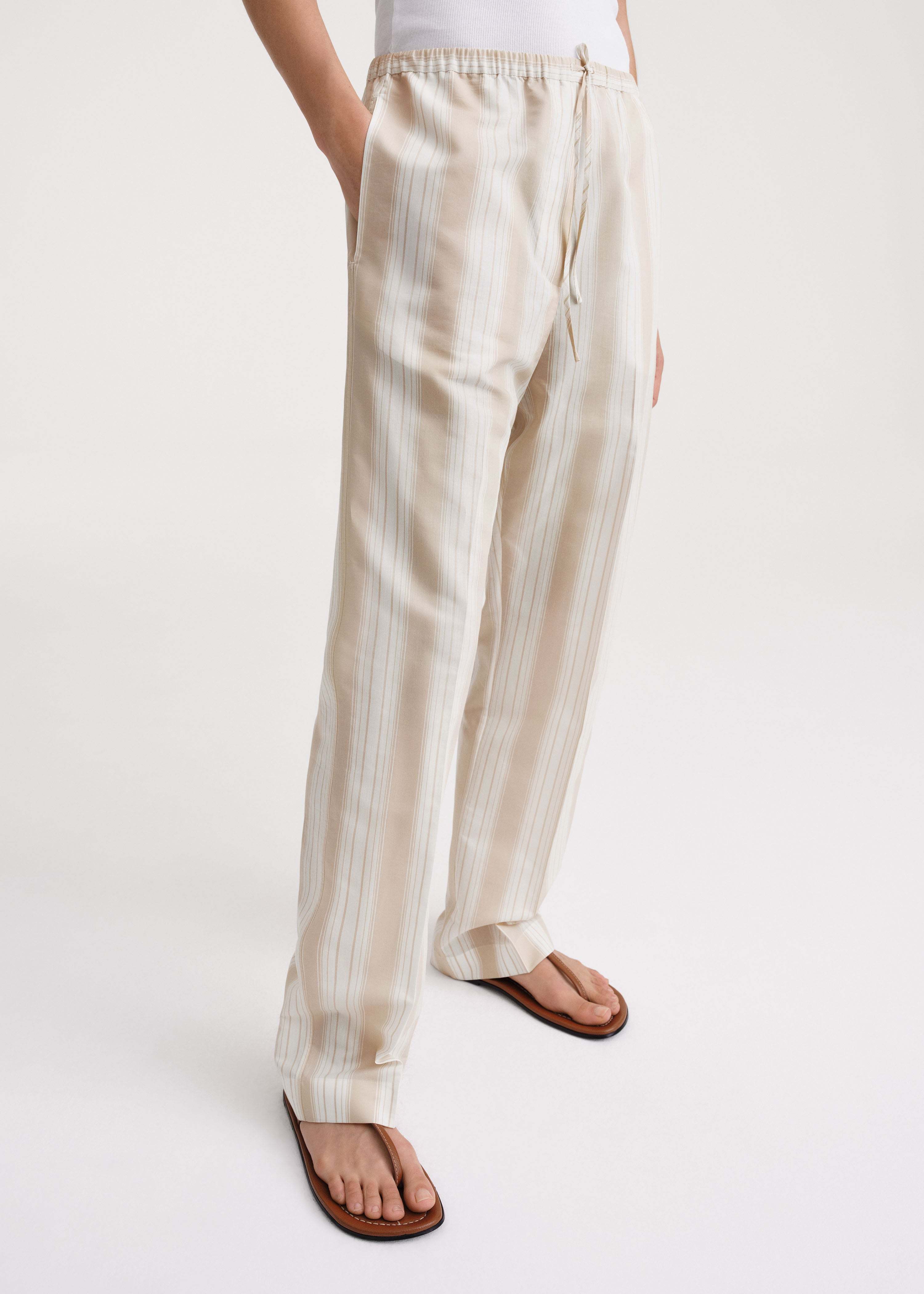 TOTÊME STRIPE-PRINT DRAWSTRING TROUSERS
