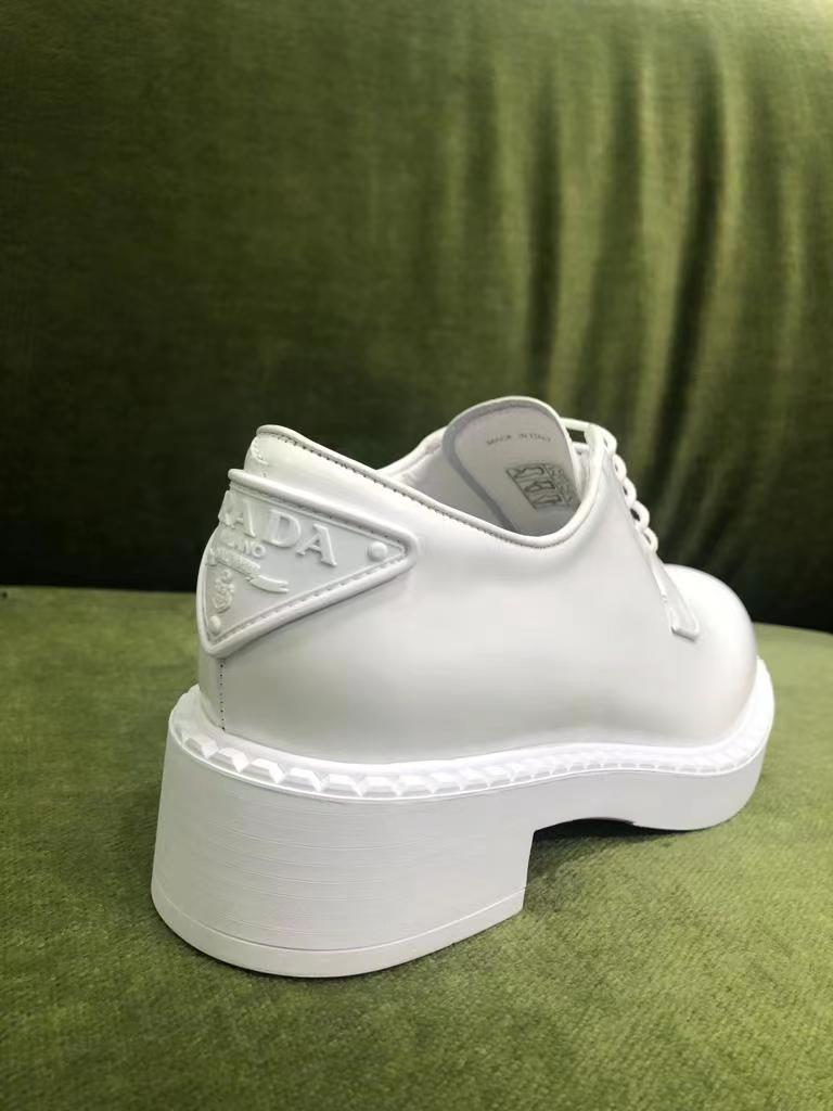 Prada Logo Lace Derby Shoes In White